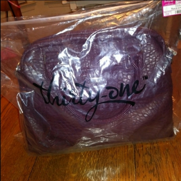 Thirty-One - Picture 2 of 3